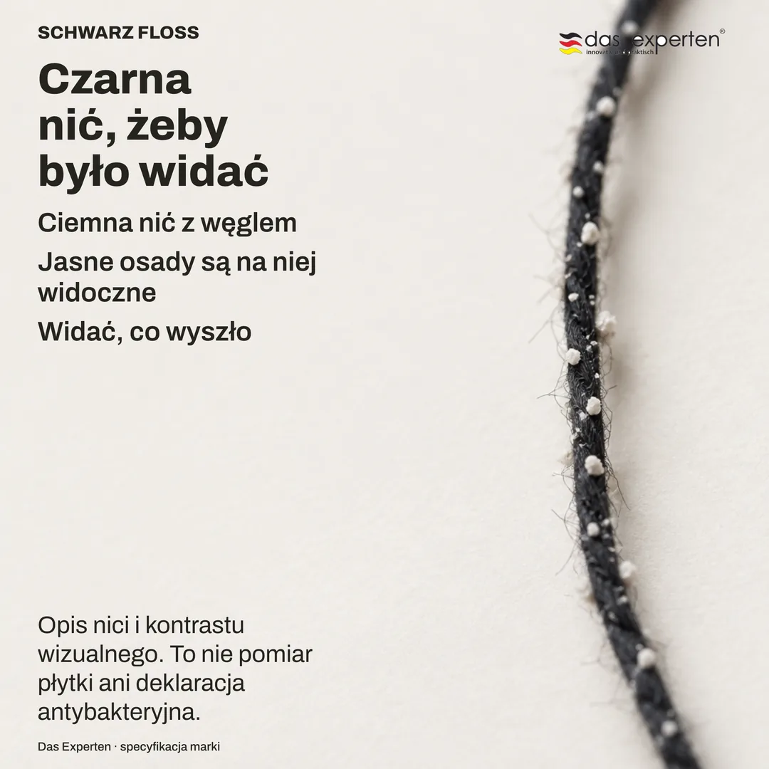 Studium kontrastu: jasny materiał na ciemnej cienkiej nici, tematem jest wyłącznie widoczność jednego na drugim